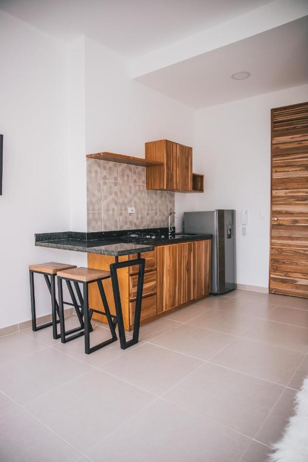 Apartasuites 21 A เปเรย์รา ภายนอก รูปภาพ